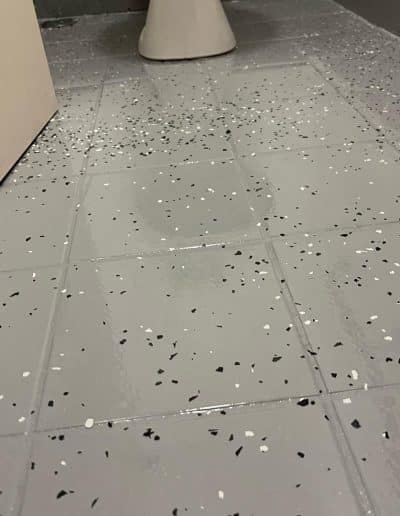 vinyl resurfacing over tiles in a bathroom